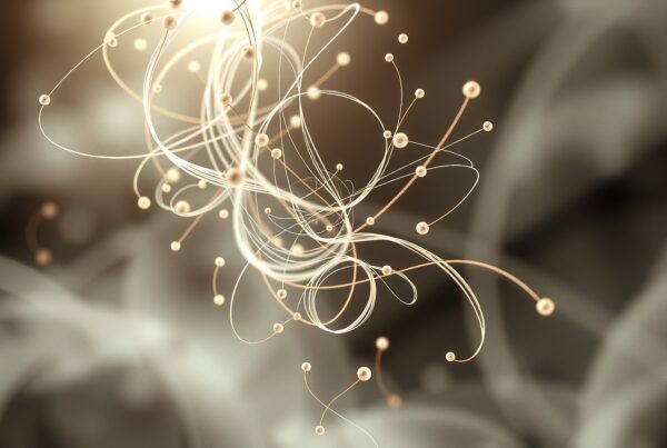 Abstract image of glowing strands and orbs creating ethereal patterns.