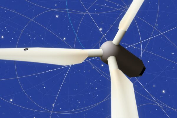 A wind turbine against a star-filled sky showcases renewable energy and technology.