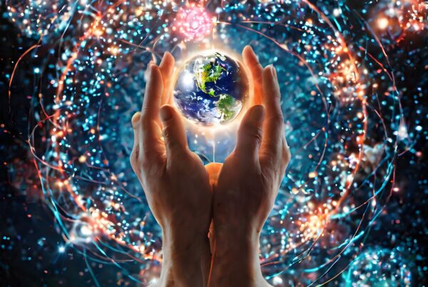 Hands holding glowing Earth in a colorful cosmic setting.