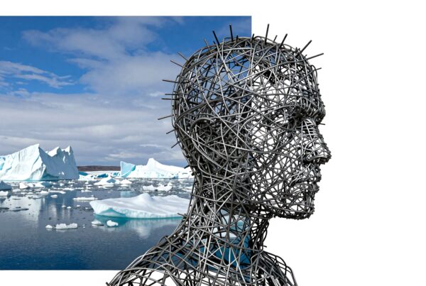 A metal head sculpture with icy landscape backdrop featuring icebergs and water.