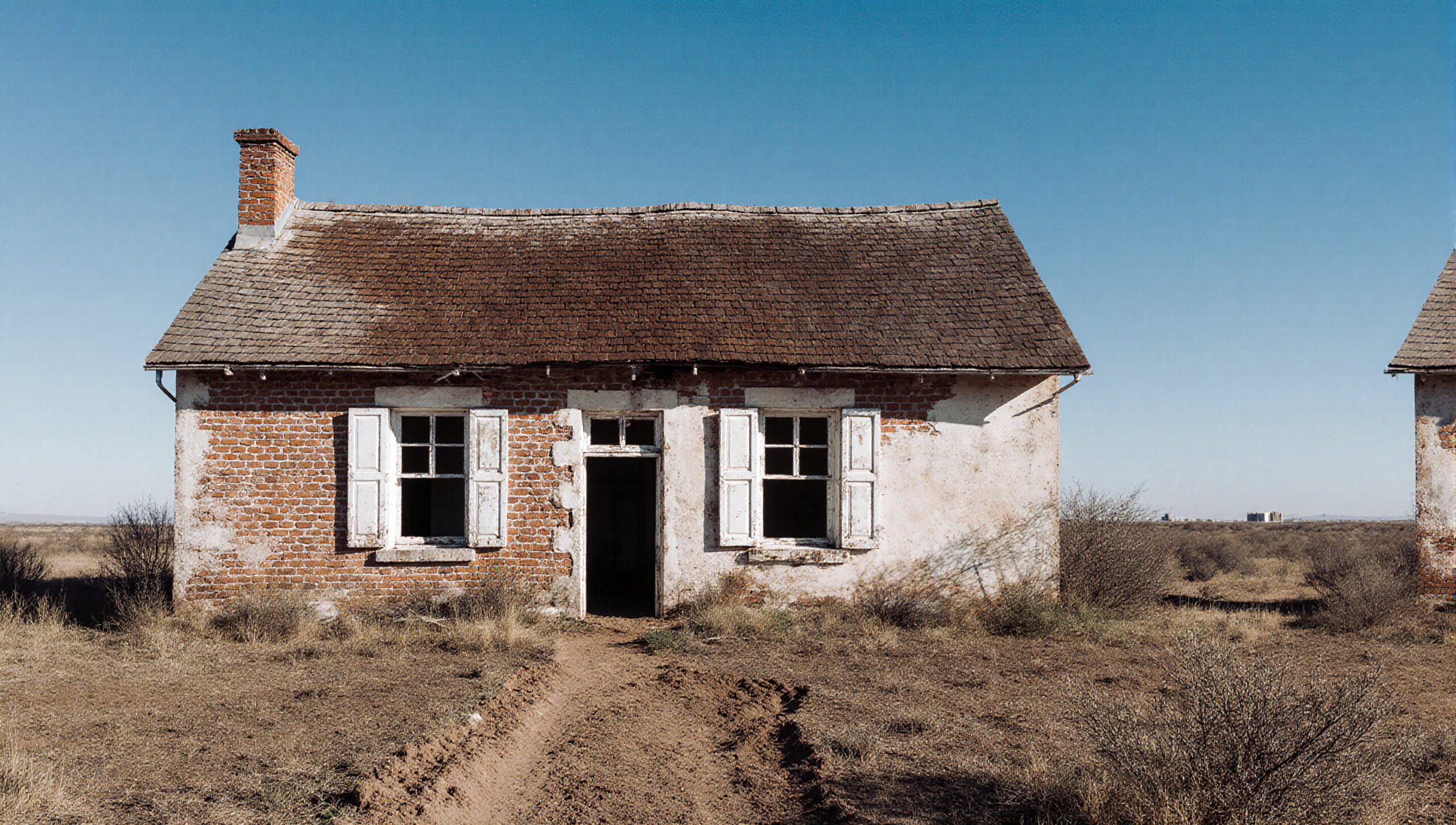 Abandoned Brick House in Desert