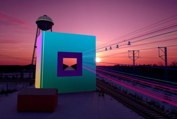Vibrant teal and purple structure with sunset backdrop.