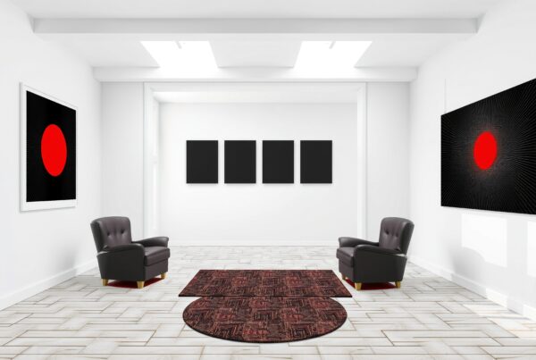 A modern art gallery with minimalist design, featuring bold abstract paintings, black leather chairs, and stylish rugs.