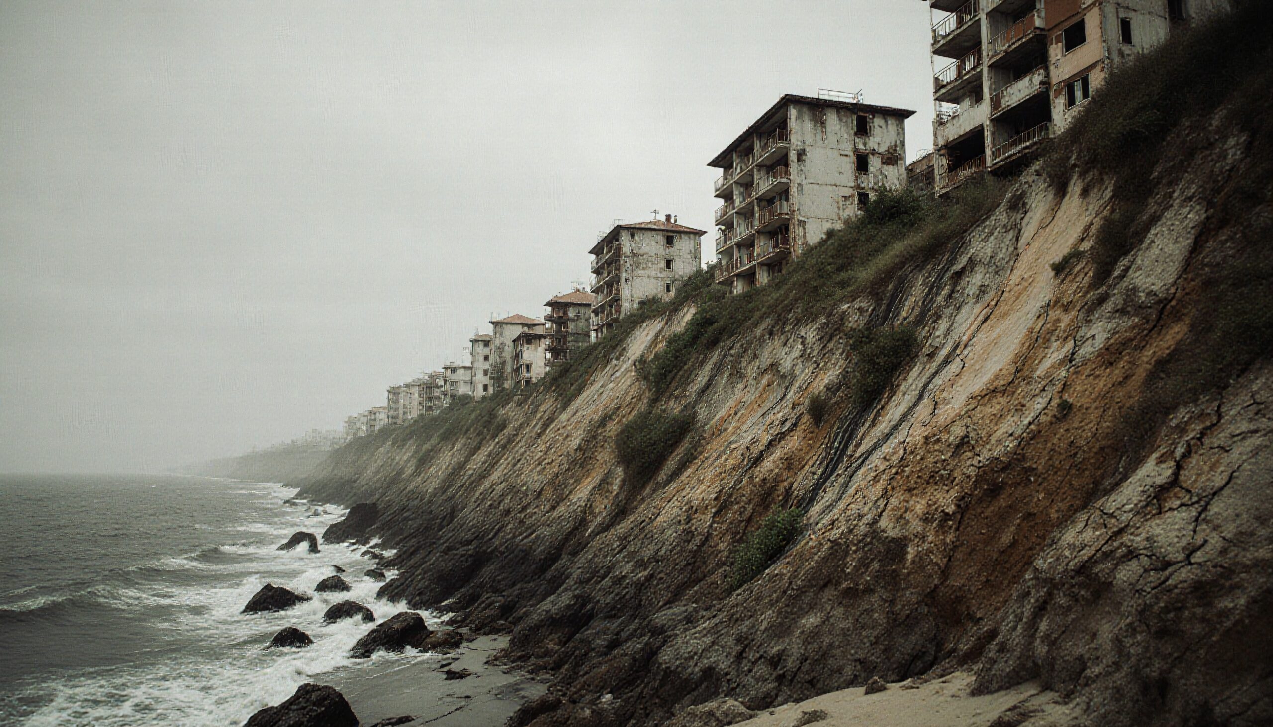 Abandoned Buildings on Eroded Cliff