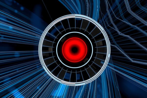Futuristic digital artwork with a vibrant red core and intricate blue lines.