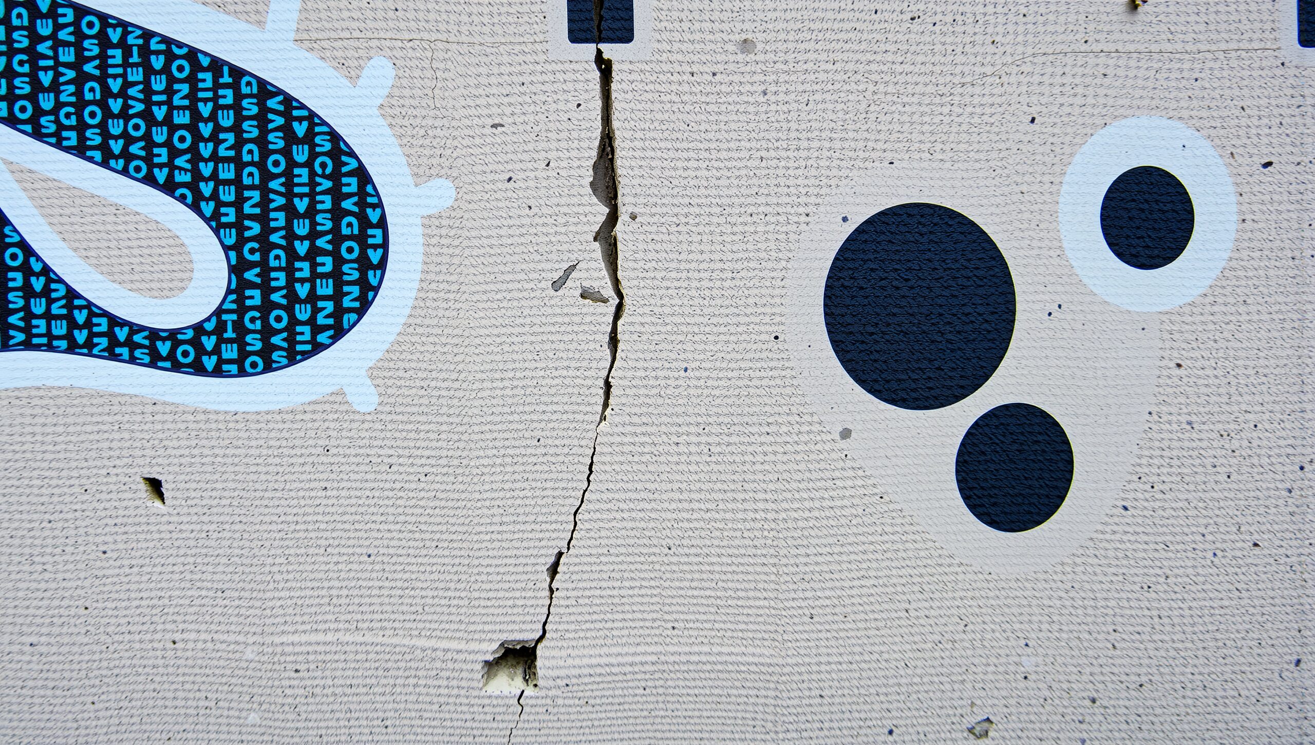 Geometric Mural with Concrete Crack