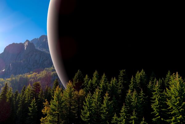 A vibrant landscape of mountains and forests meets a vast celestial body under a clear blue sky.