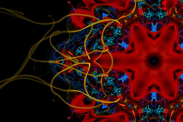 Vibrant digital artwork with kaleidoscope-like symmetry in red, blue, and yellow.